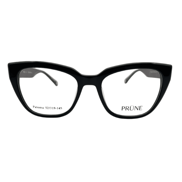 Armazón de receta PRÜNE modelo Paloma en acetato negro brillante con formato cat-eye marcado.