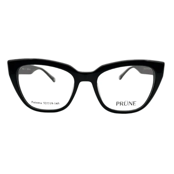 Armazón de receta PRÜNE modelo Paloma en acetato negro brillante con formato cat-eye marcado.